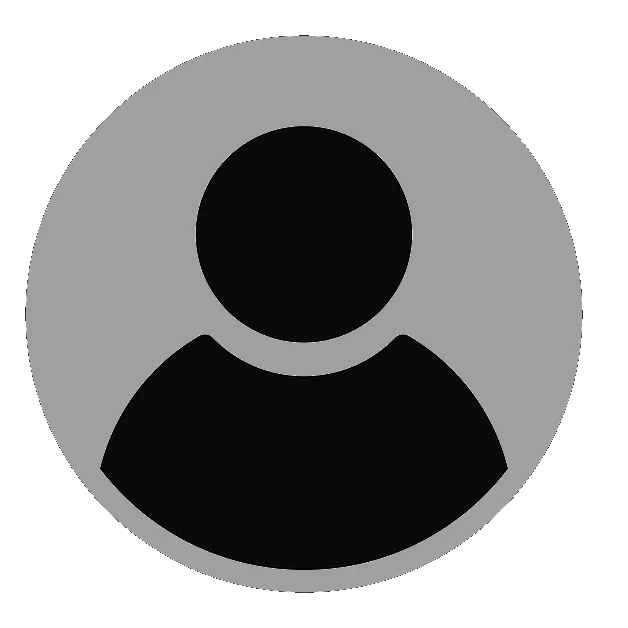 Mechanic tuning a cafe racer engine inside a garage in Medellín